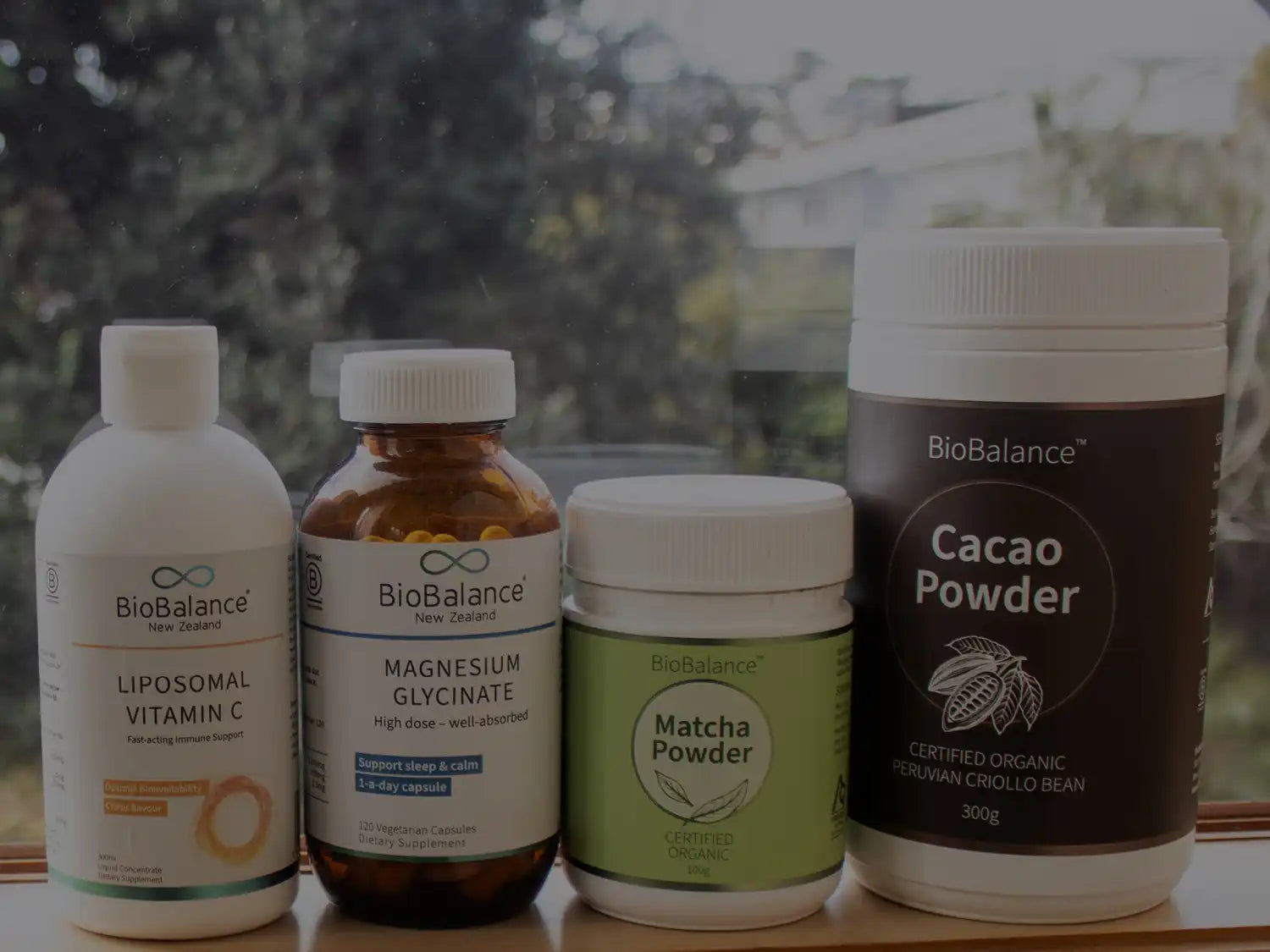 4 BioBalance products displayed on a window sill.
