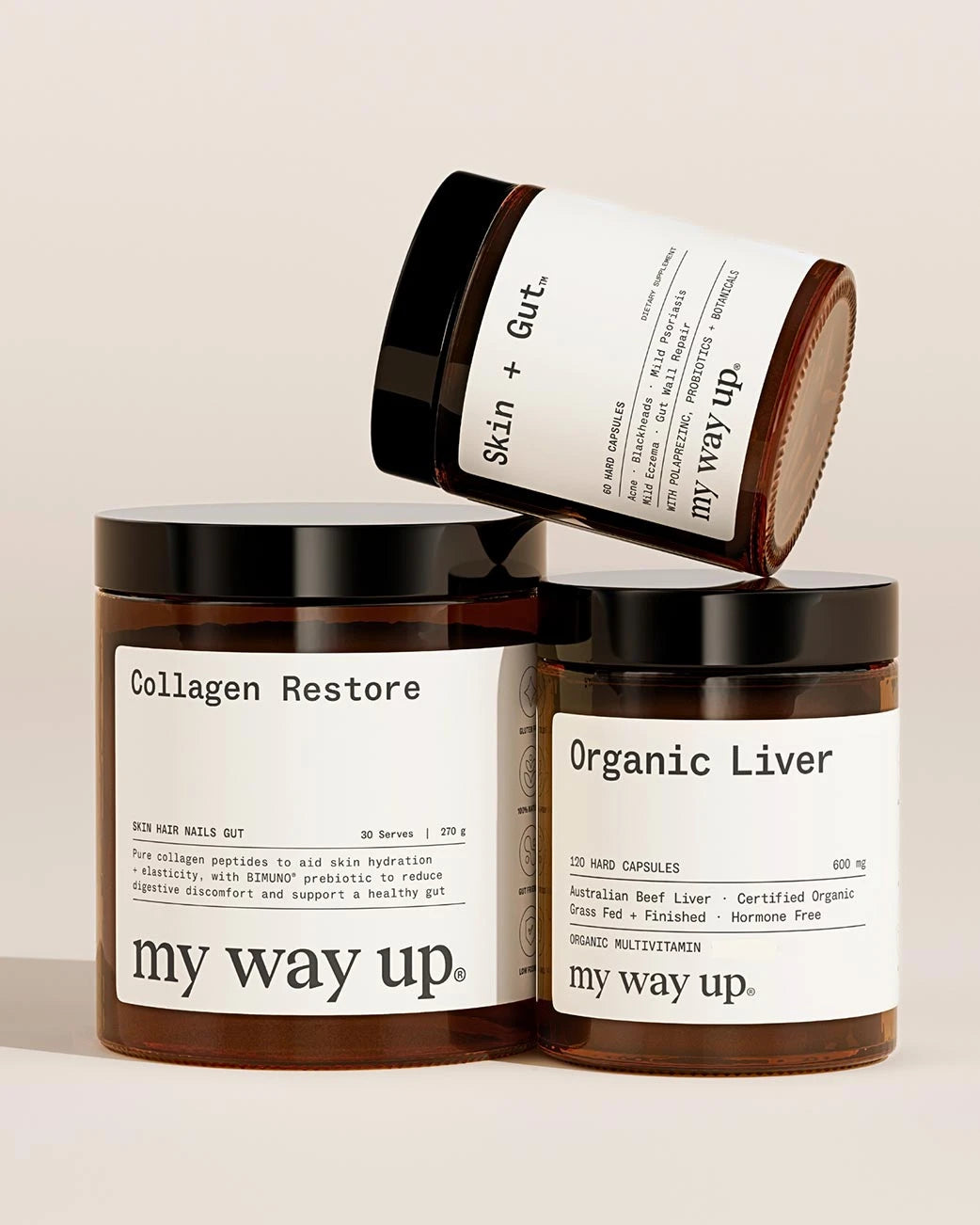 Three 'My Way Up' supplement containers on a beige background
