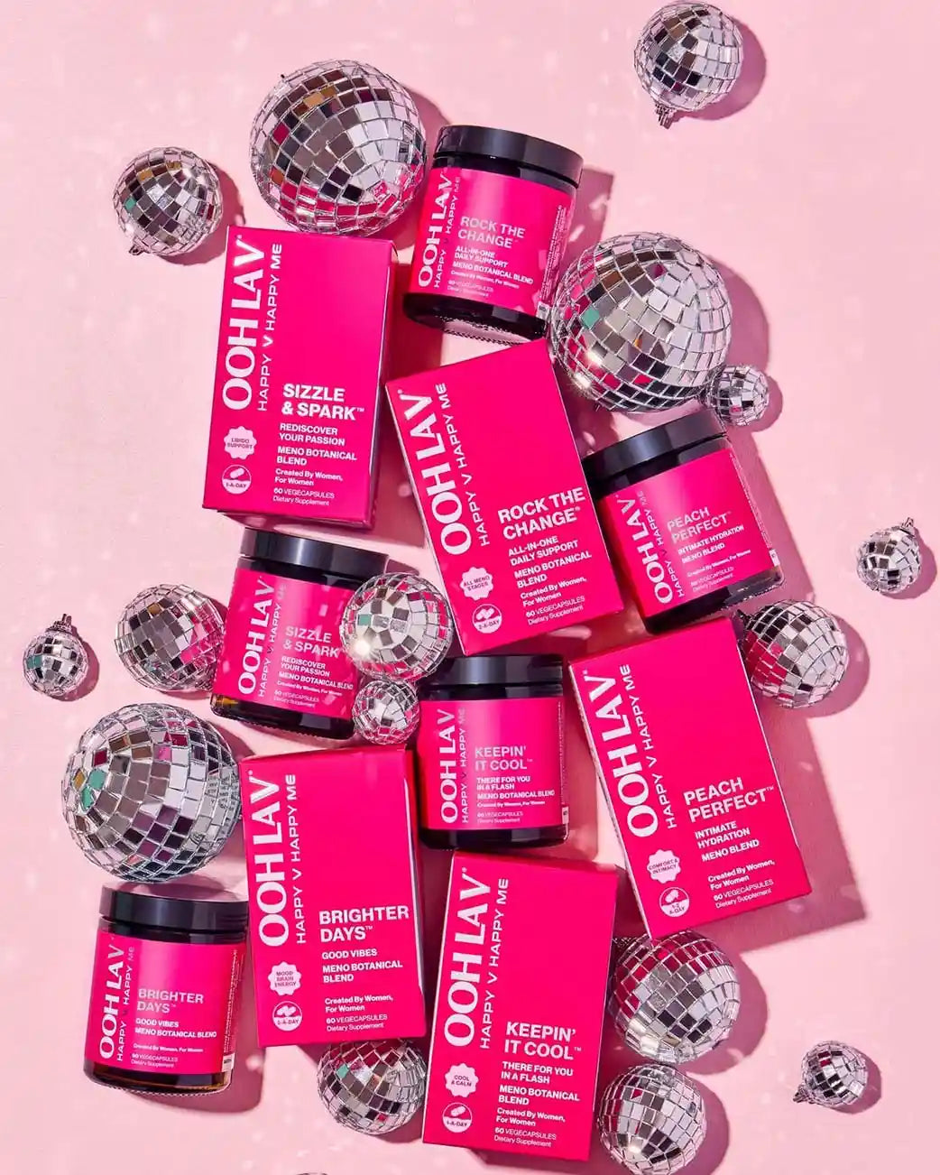 Ooh La V menopause supplements with disco balls on a pink background