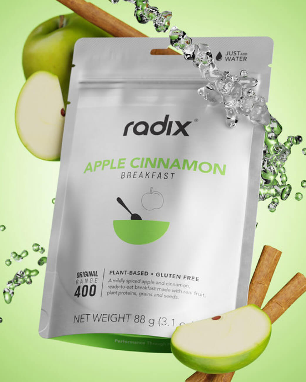 Radix Apple Cinnamon breakfast package with green apples and cinnamon sticks on a light green background.