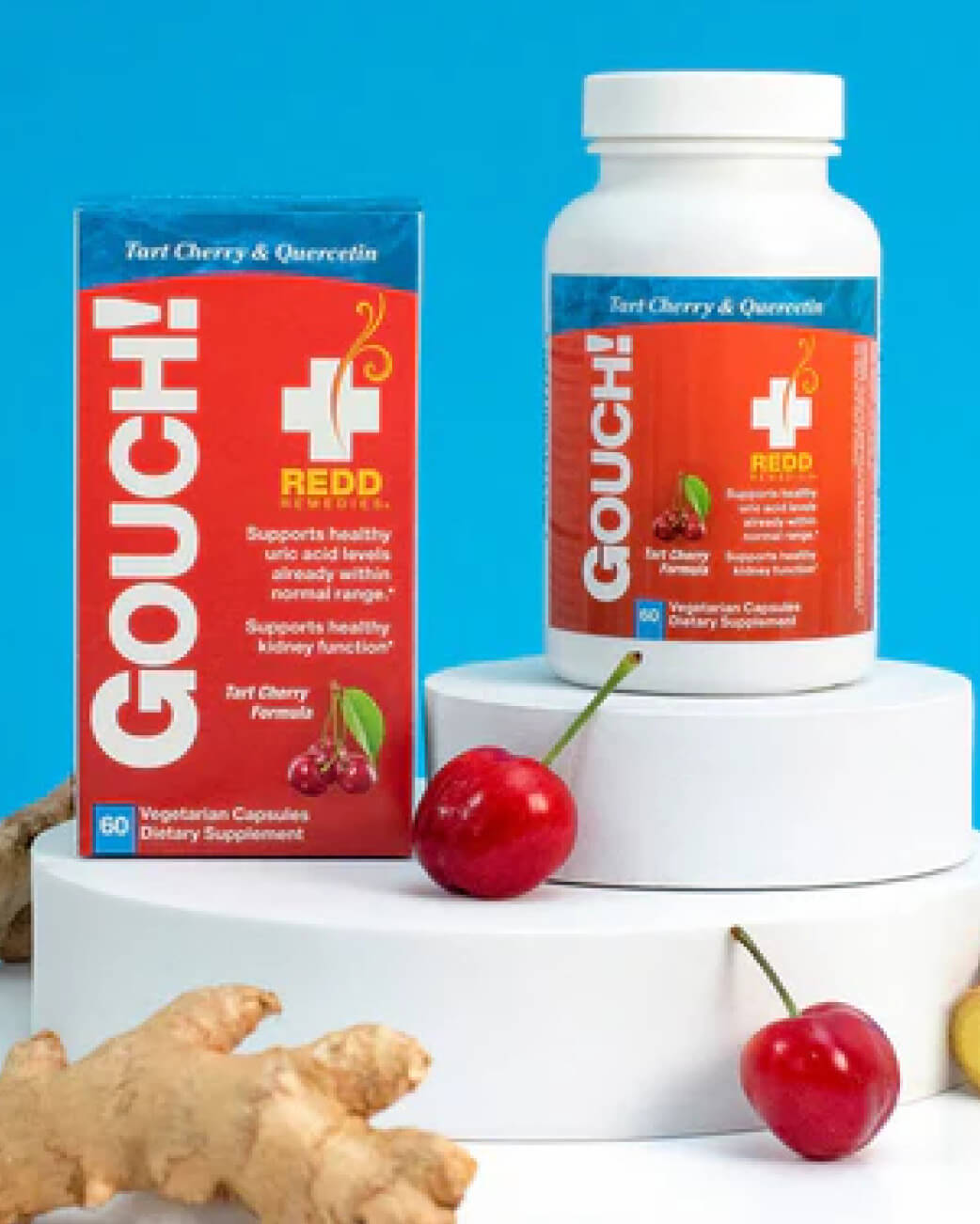 Supplement bottle and packaging with cherries and ginger on a blue background.