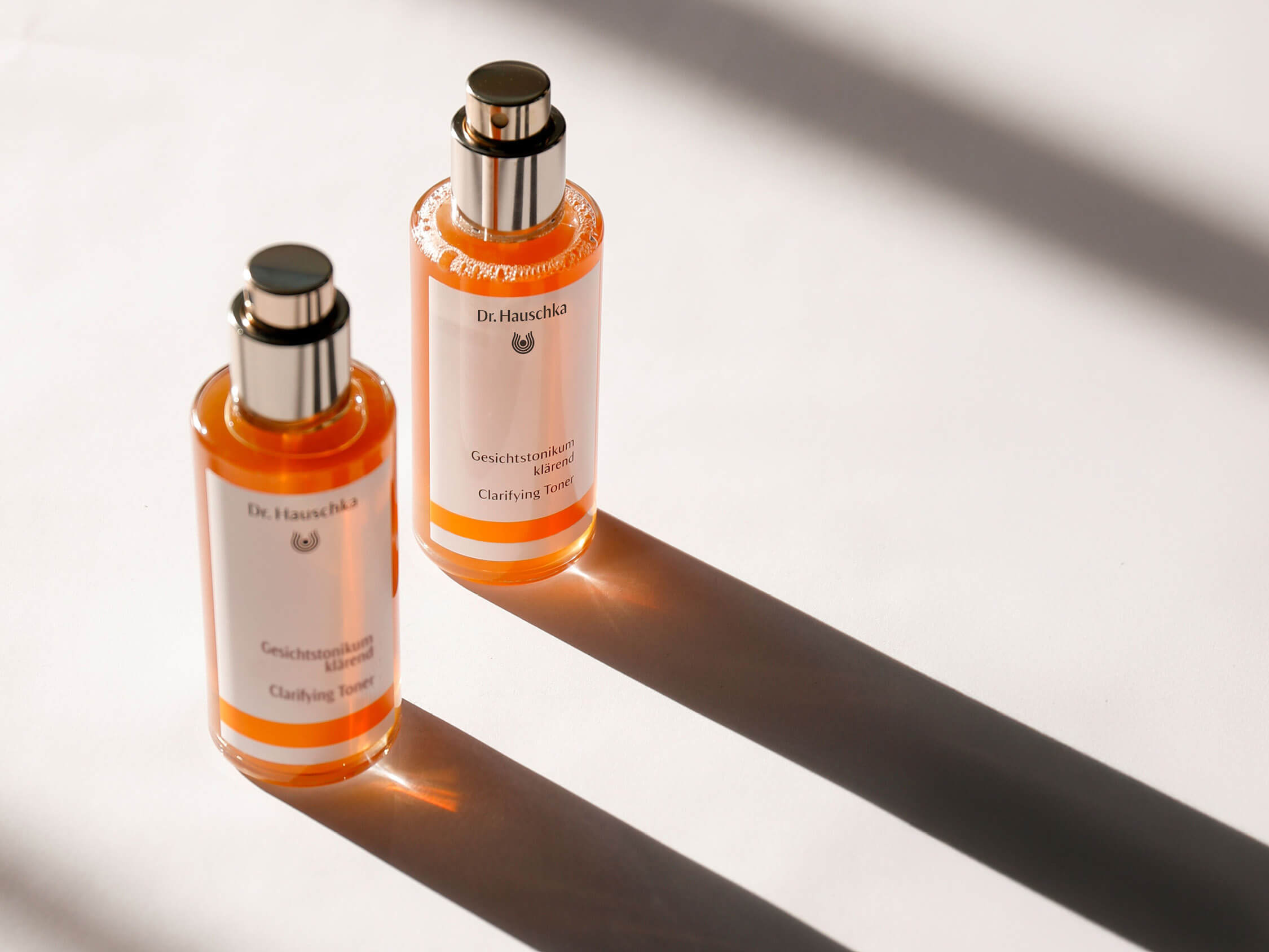 Dr. Hauschka Clarifying Toner on a white surface with shadows.