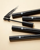 Lily Lolo mascaras against a cream background.