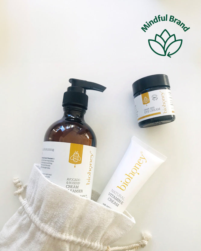 Three skincare products from the Mindful Brand on a light background