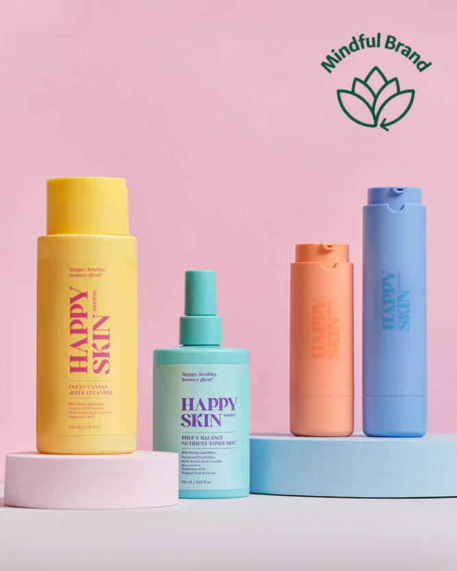 Four colorful skincare bottles with Happy Skin branding on a pink background with a Mindful Brand logo.