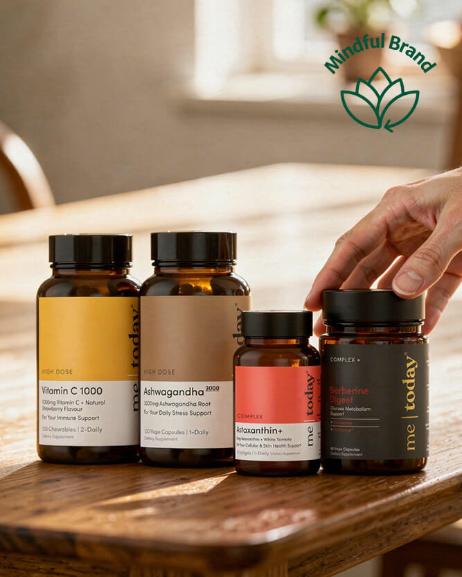 Me Today supplement bottles on a wooden table.
