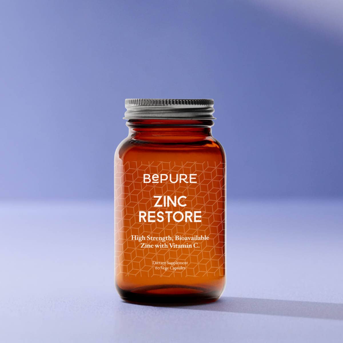 BePure Zinc Restore supplement bottle on a gradient blue background