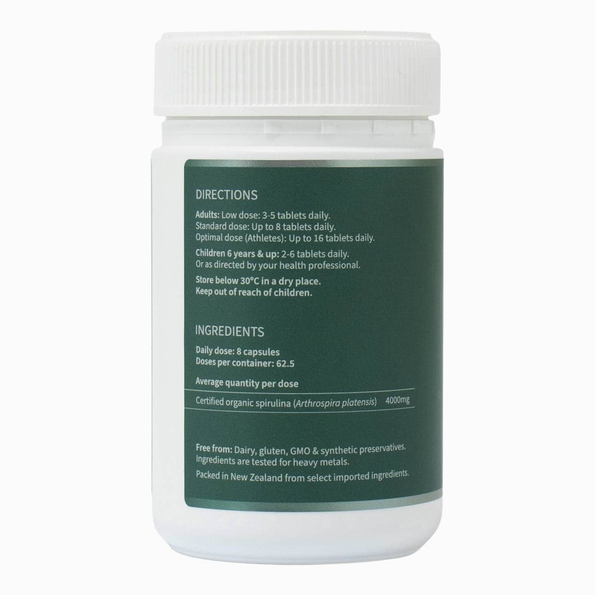 Side of BioBalance Spirulina Tablets container with white lid and green label showing directions and ingredietns on a white background.