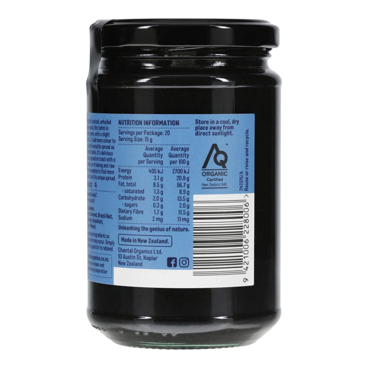 Black Tahini with a blue label showing nutritional information.