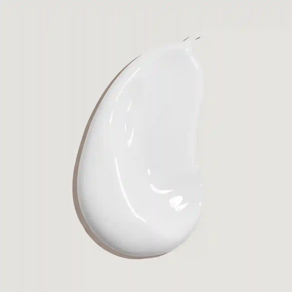 White ceramic teardrop-shaped plate on a light gray background