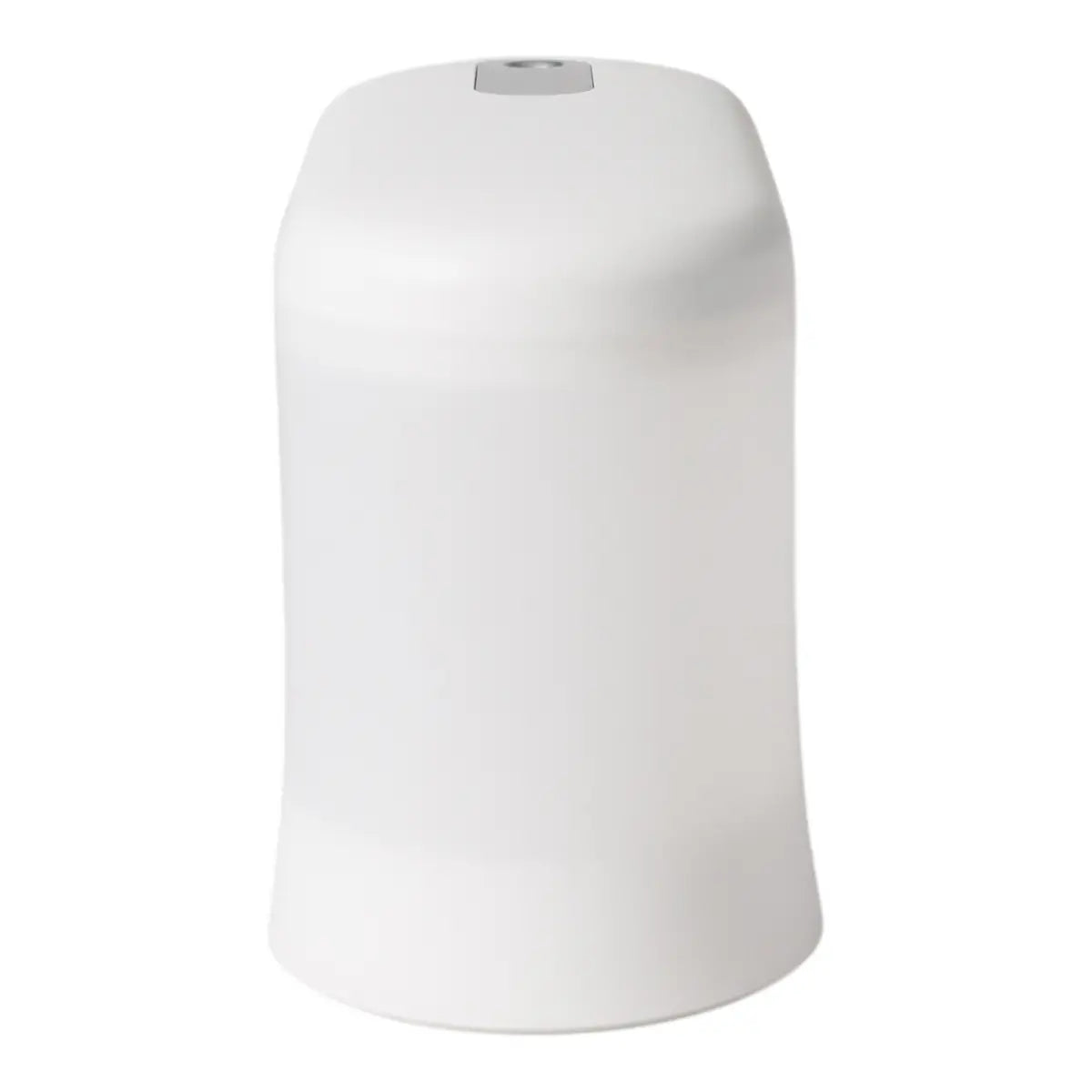 Side view of a white plastic humidifier and aroma diffuser on a white background.