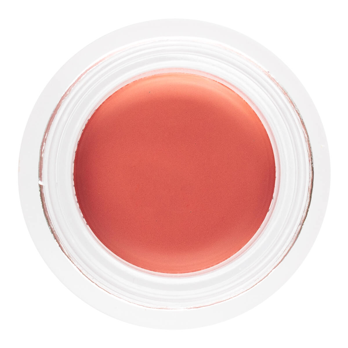 Jar of peach-colored cream on a white background.