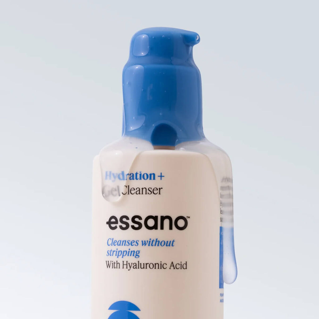 Essano cleanser bottle with blue pump on a light grey background.