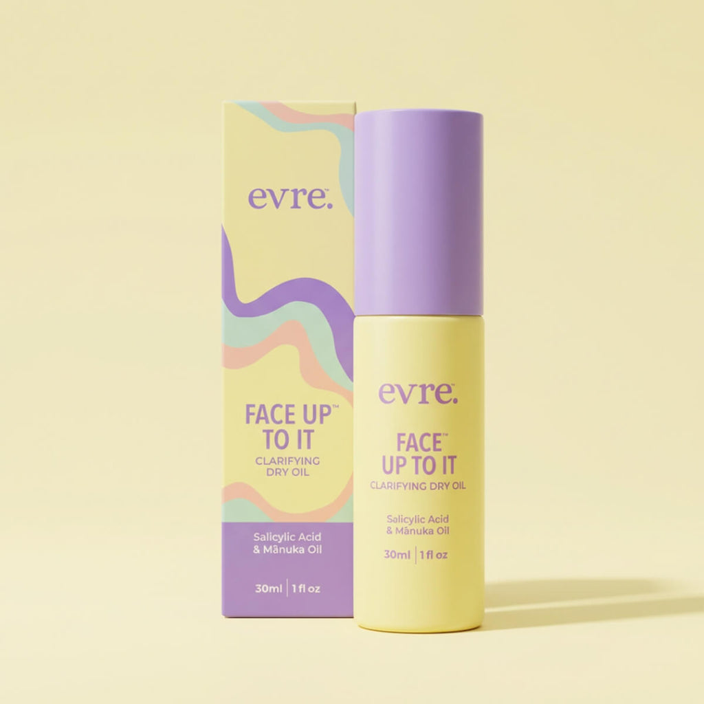 Evre Face Up To It clarifying dry oil bottle and packaging on a yellow background