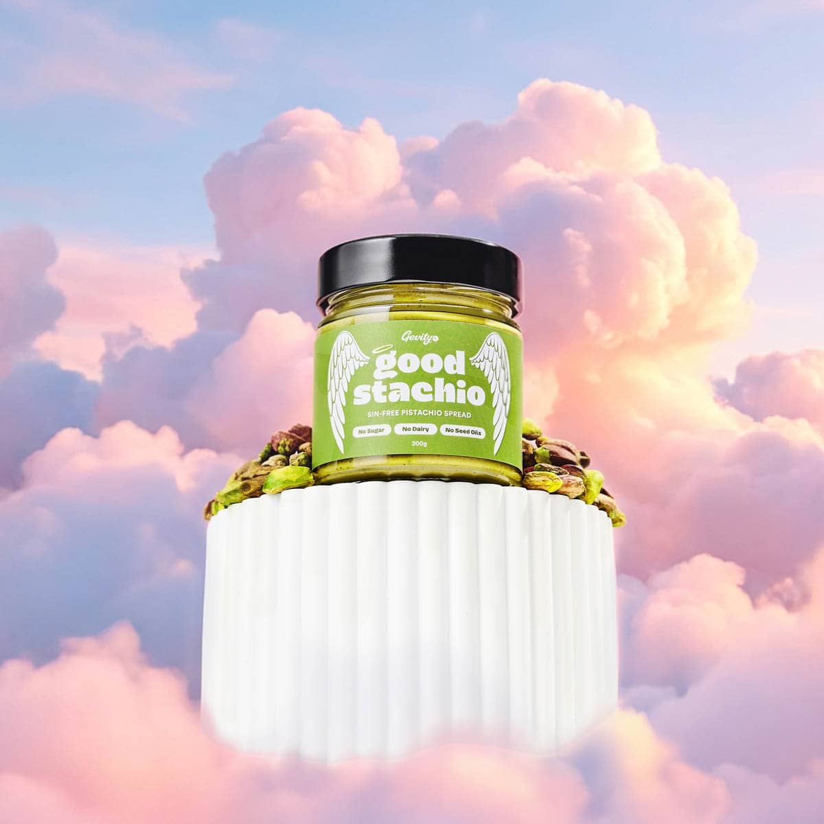 Jar of 'Good Stachio' against a colourful cloud background