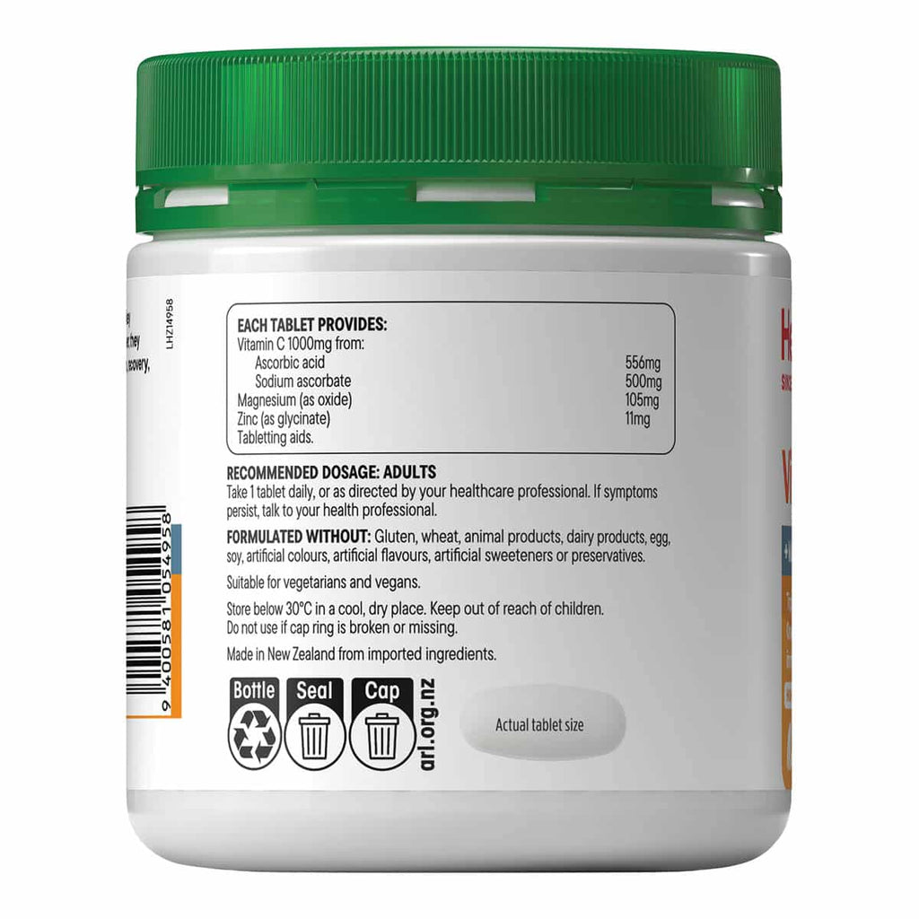 Back view of a supplement jar with green lid and white label on a white background.