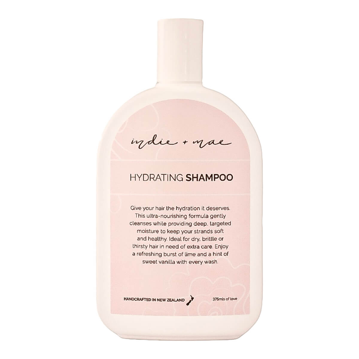 A bottle of Indie + Mae Hydrating Shampoo, featuring a soft pink and white design with black text.