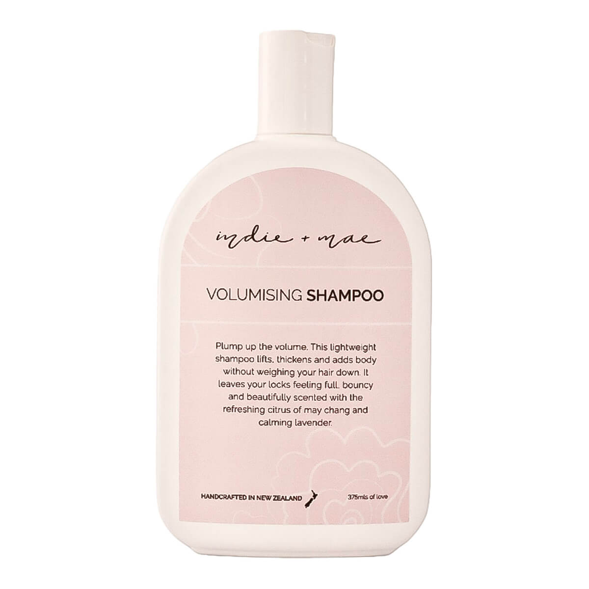 A 300ml bottle of Indie + Mae Volumising Shampoo, featuring a soft pink and white design with black text.