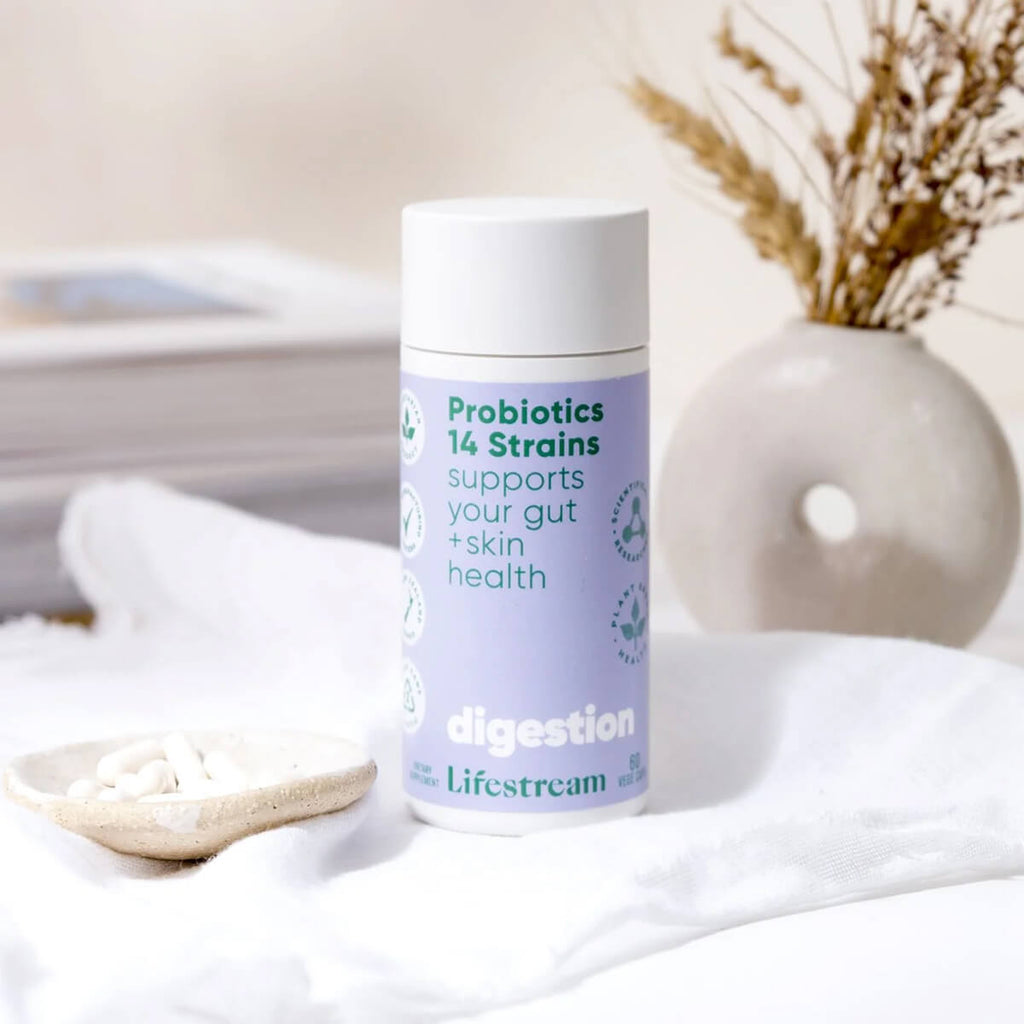 Lifestream probiotics container on a white surface with a blurred background.