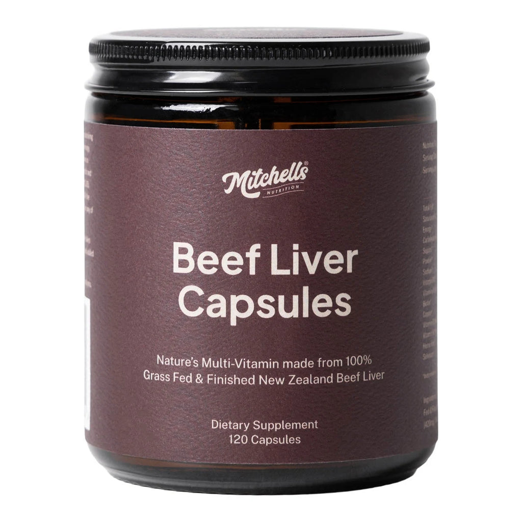 Mitchell's Beef Liver Capsules dietary supplement in an amber glass jar with a dark brown label and black lid, on a white background.