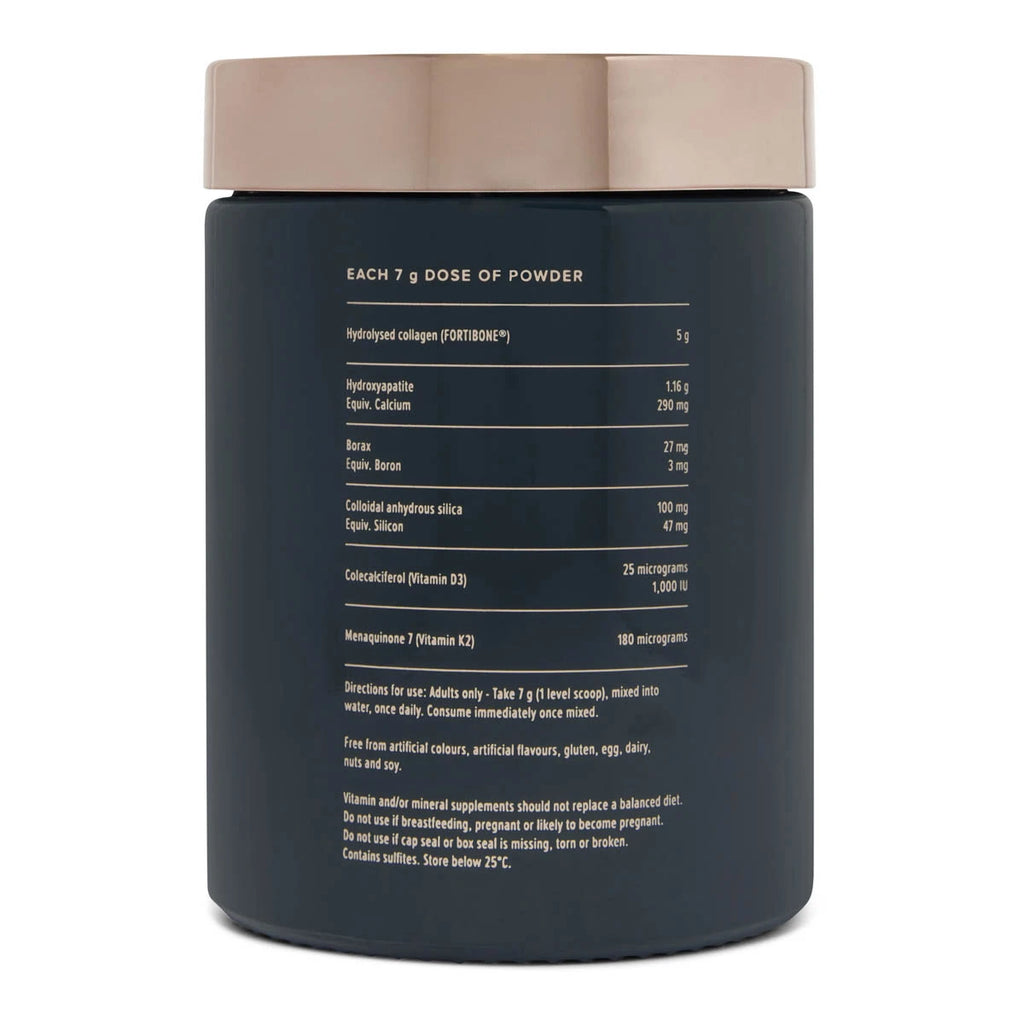 A dark navy blue supplement powder jar with a beige lid, showing the back label with ingredients and dosage information in white text, on a white background.