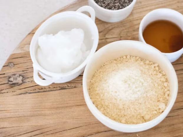Bowls of different ingredients on a wooden surface