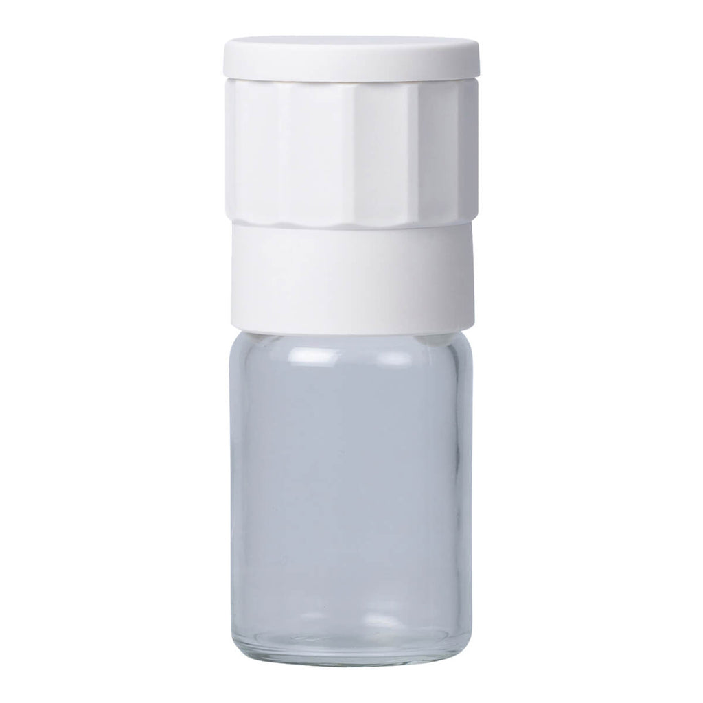 Salt of the Earth Ceramic Sea Salt Grinder, a spice grinder out of a fine porcelain material that is non-corrosive. Metal and nylon free grinding mechanism. Easy to clean with a removable and refillable glass jar.