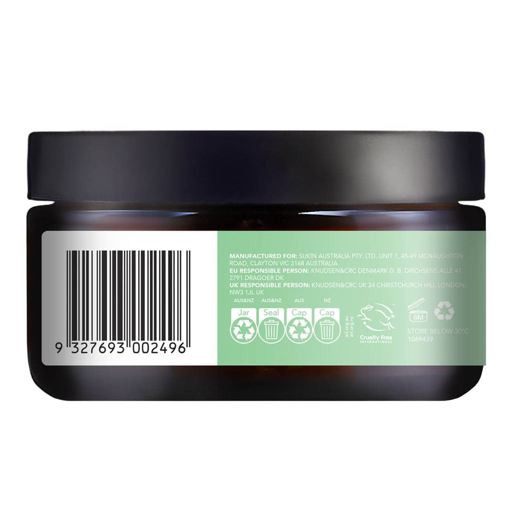 Back view of a cosmetic jar with a label, barcode, and recycling symbols on a white background.