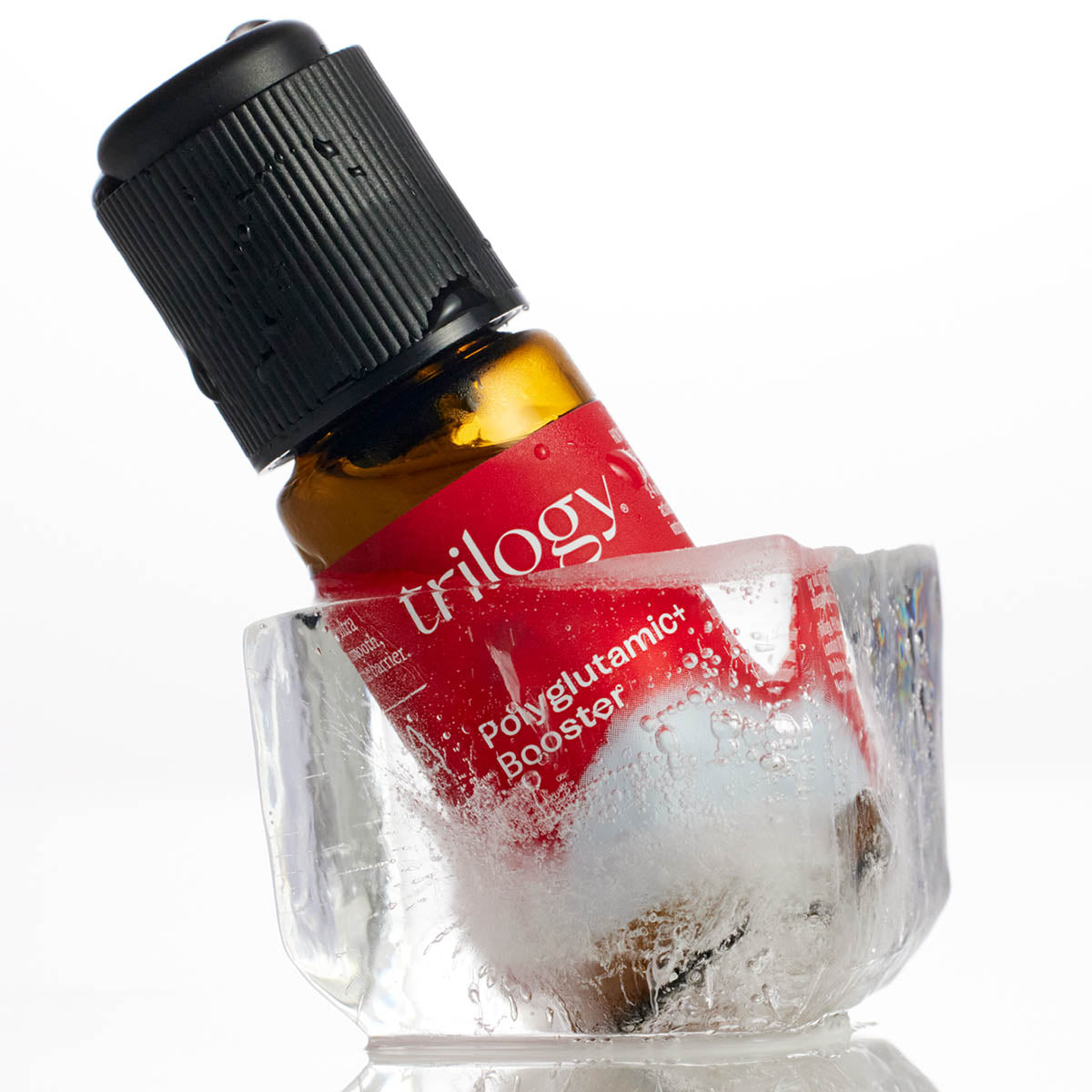 Bottle of Trilogy Polyglutamic Booster with a black cap on a white background