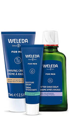 three blue weleda mens shaving products on white background