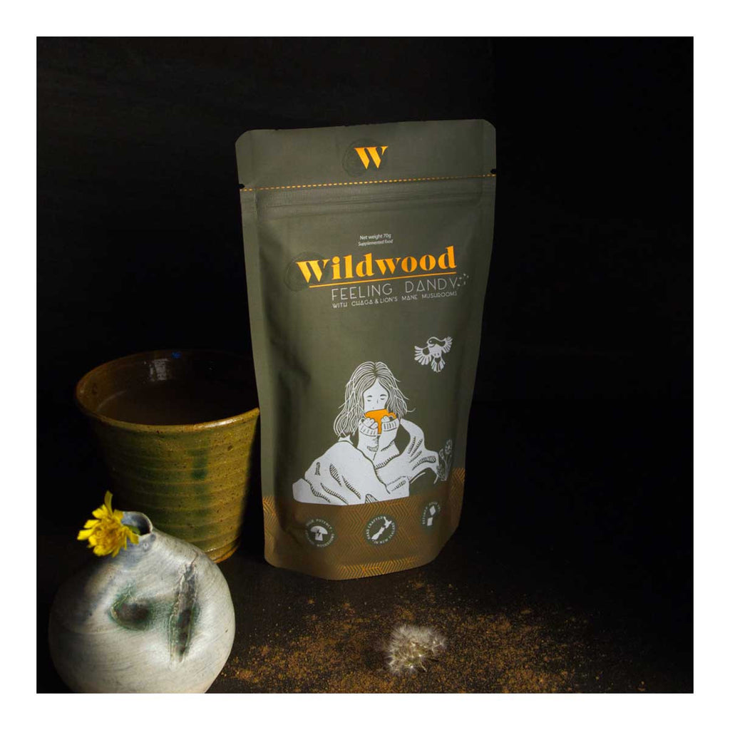Wildwood coffee package with a cup and decorative elements on a dark background
