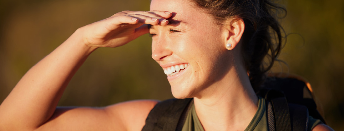 woman looking optimistic in nature