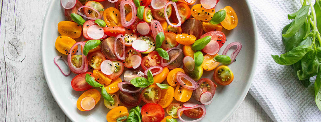 Close Up of Simple Summer Tomato Salad Using Elderberry Switchel