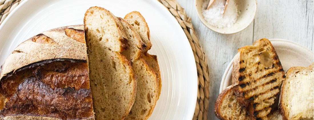 Homemade sliced sourdough on table